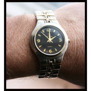 vintage Calvin Hill men's quartz watch w/silver/gold metal band